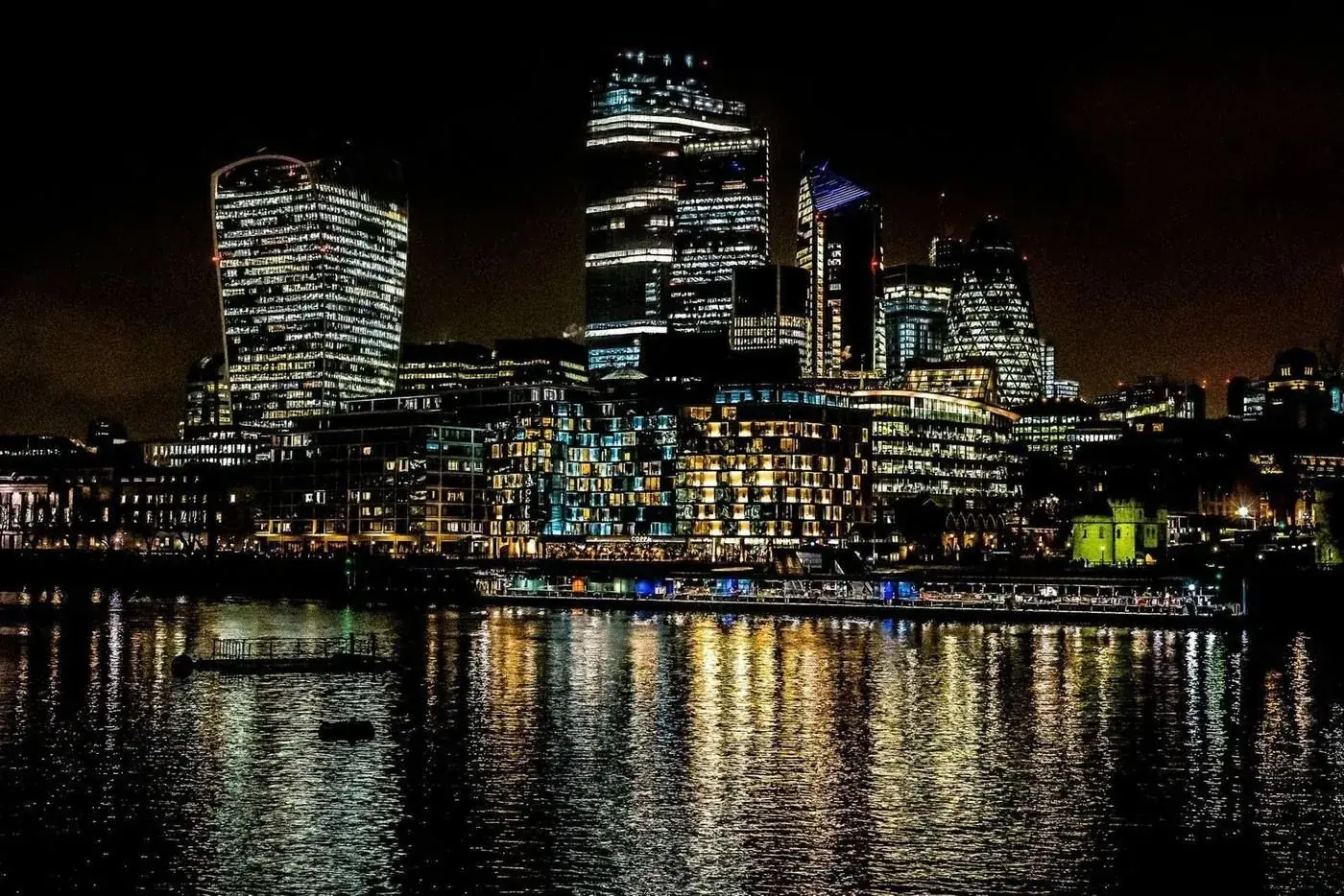 The City of London skyline at night, representing UK commercial construction tendering and estimating