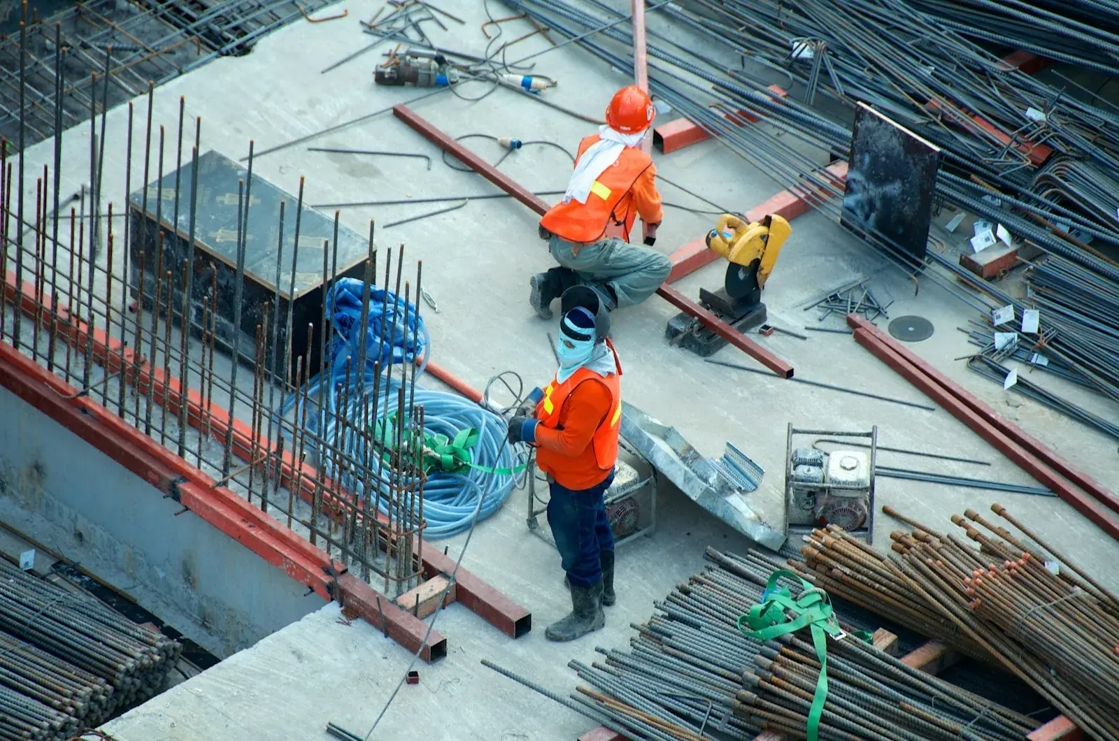 Commercial construction site interior with structural framework and atmospheric lighting