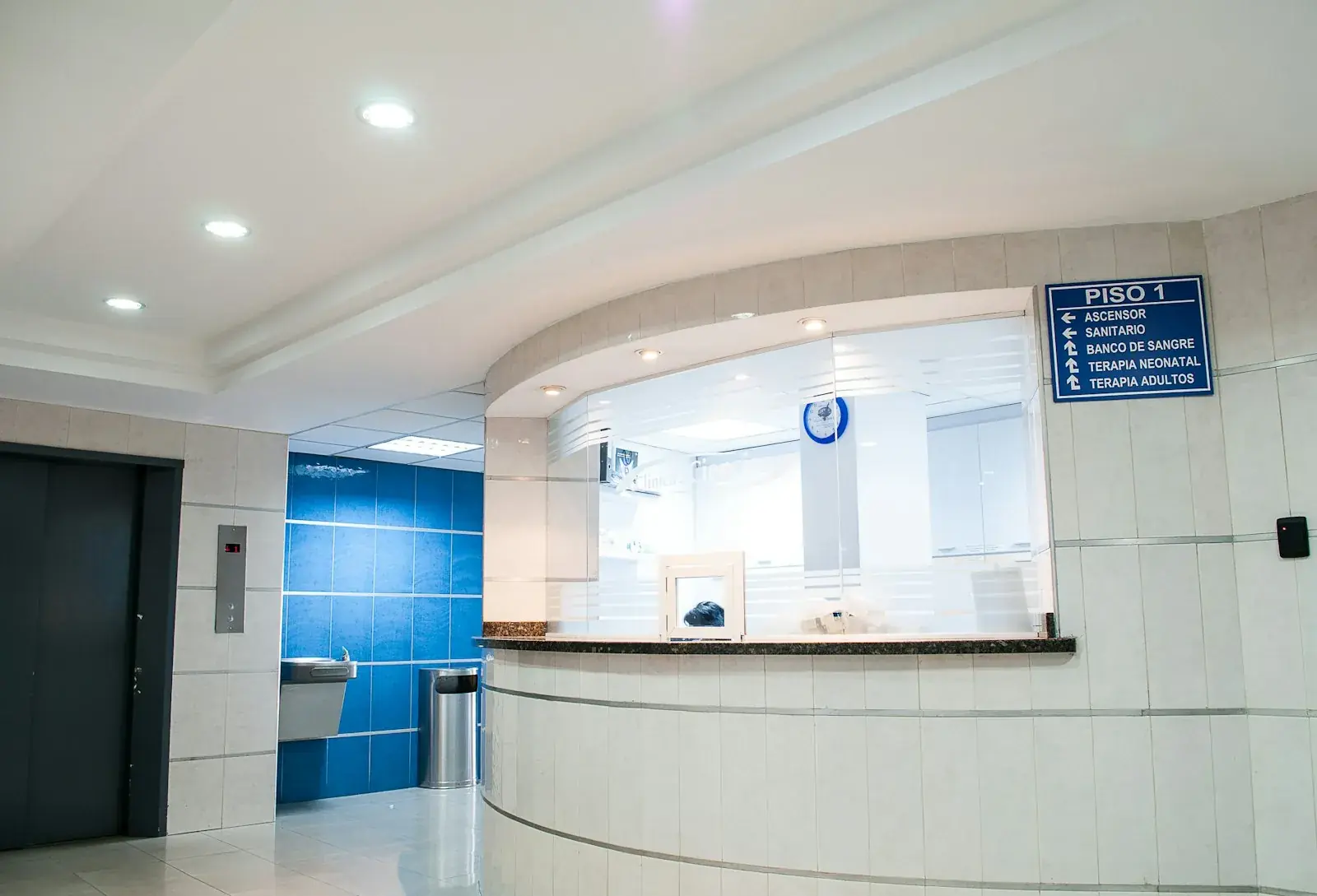 Modern healthcare clinical facility interior showing treatment rooms and medical equipment